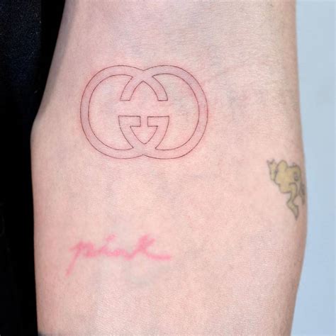 gucci symbol tattoos|gucci brand tattoo.